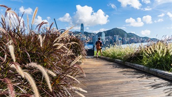 The Sightseeing Deck faces Victoria Harbour offering a panoramic view of the skyline of Hong Kong Island.